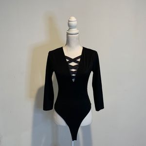 Victoria's Secret Cross front black body suit. Size S
